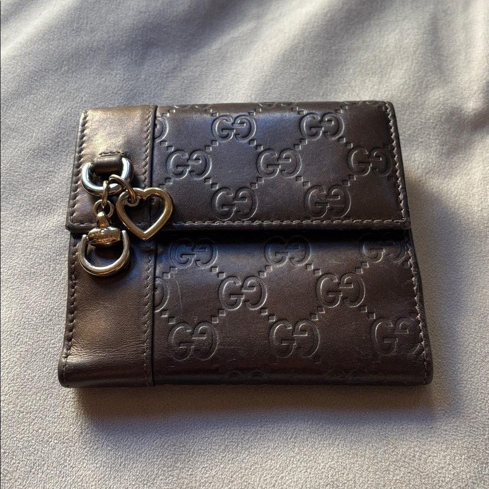 Gucci Vintage Guccissma Brown Embossed Leather Bifold Wallet with Gold Charm